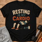 Black t-shirt with "RESTING IS MY CARDIO" text and illustration of a man sleeping on a bench.