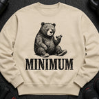 Beige sweatshirt with a distressed print of a bear lifting a dumbbell and the word "MINIMUM".