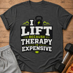 Dark grey t-shirt with "I LIFT BECAUSE THERAPY IS EXPENSIVE" text and graphics.
