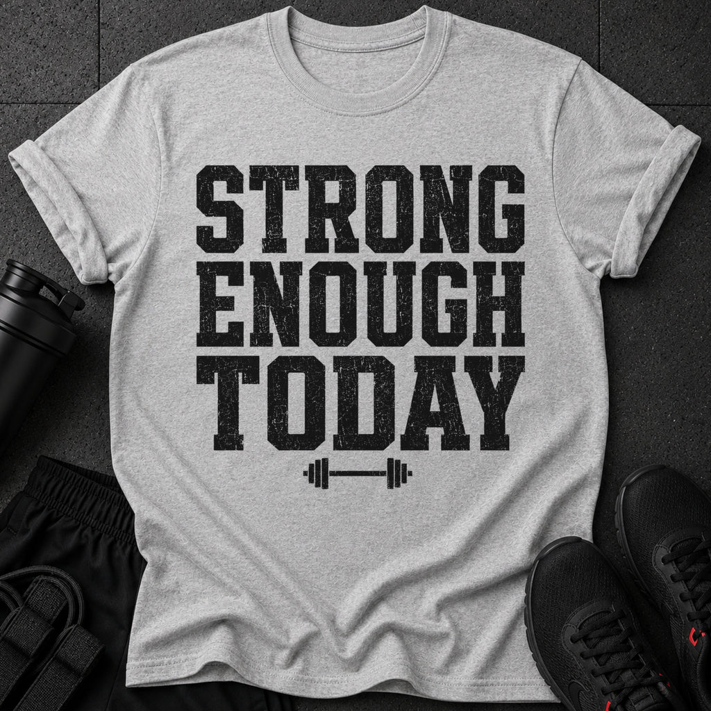 Grey t-shirt with black distressed text "STRONG ENOUGH TODAY" and a barbell graphic.