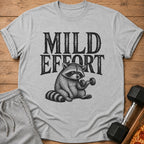 T-shirt with distressed text "MILD EFFORT" and a raccoon lifting a dumbbell.