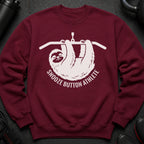 Maroon sweatshirt with a white graphic of a sloth hanging from a bar and the text "Snooze Button Athlete".