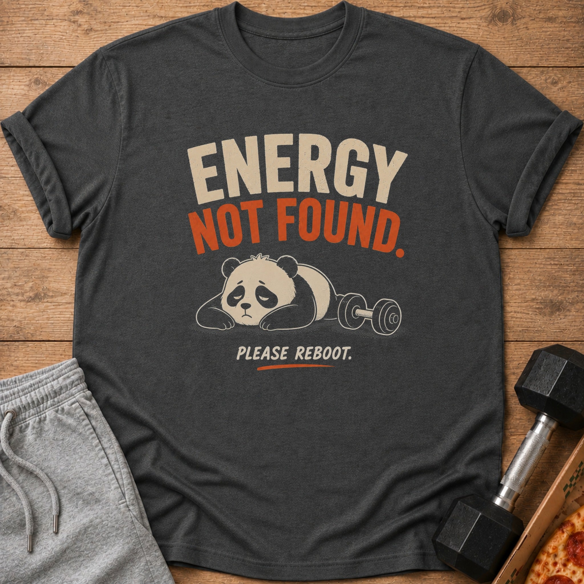 Dark grey t-shirt with panda, dumbbell, and text "ENERGY NOT FOUND. PLEASE REBOOT."