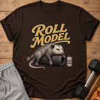 Brown t-shirt with opossum saying "Roll Model" and a water bottle.