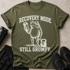 Green t-shirt with grumpy frog holding protein shaker and "Recovery Mode Still Grumpy" text.