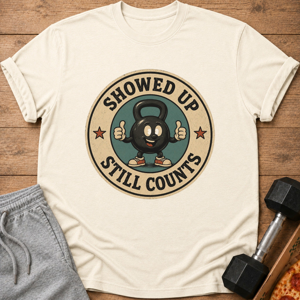 Kettlebell character with thumbs up and text "SHOWED UP STILL COUNTS".