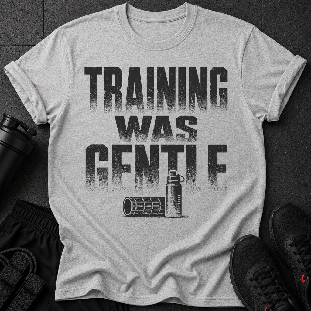 Gray t-shirt with distressed text "TRAINING WAS GENTLE" and graphics of fitness equipment.