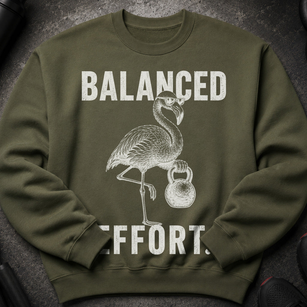 Olive sweatshirt with a white graphic of a flamingo wearing glasses, holding a kettlebell, and text.