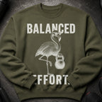 Olive sweatshirt with a white graphic of a flamingo wearing glasses, holding a kettlebell, and text.