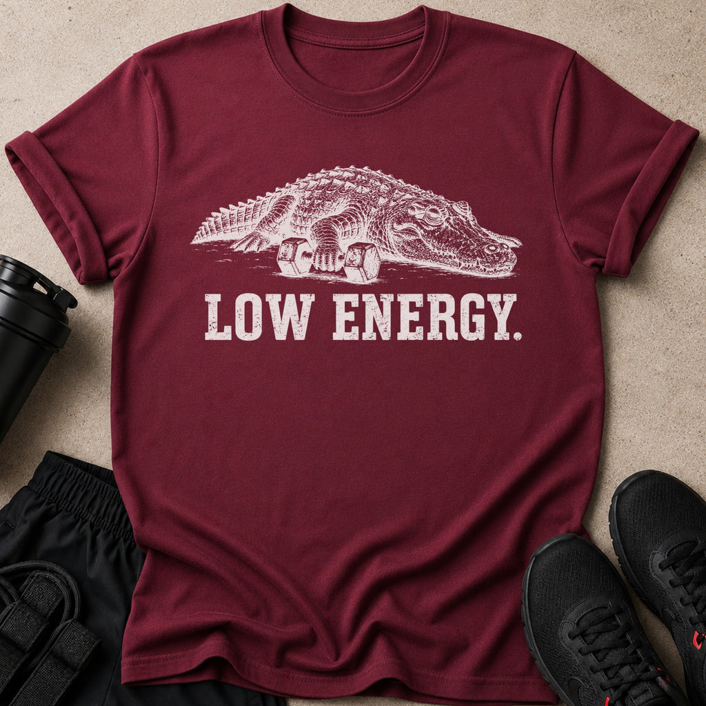 Maroon t-shirt with white graphic of alligator on weights and text "LOW ENERGY".