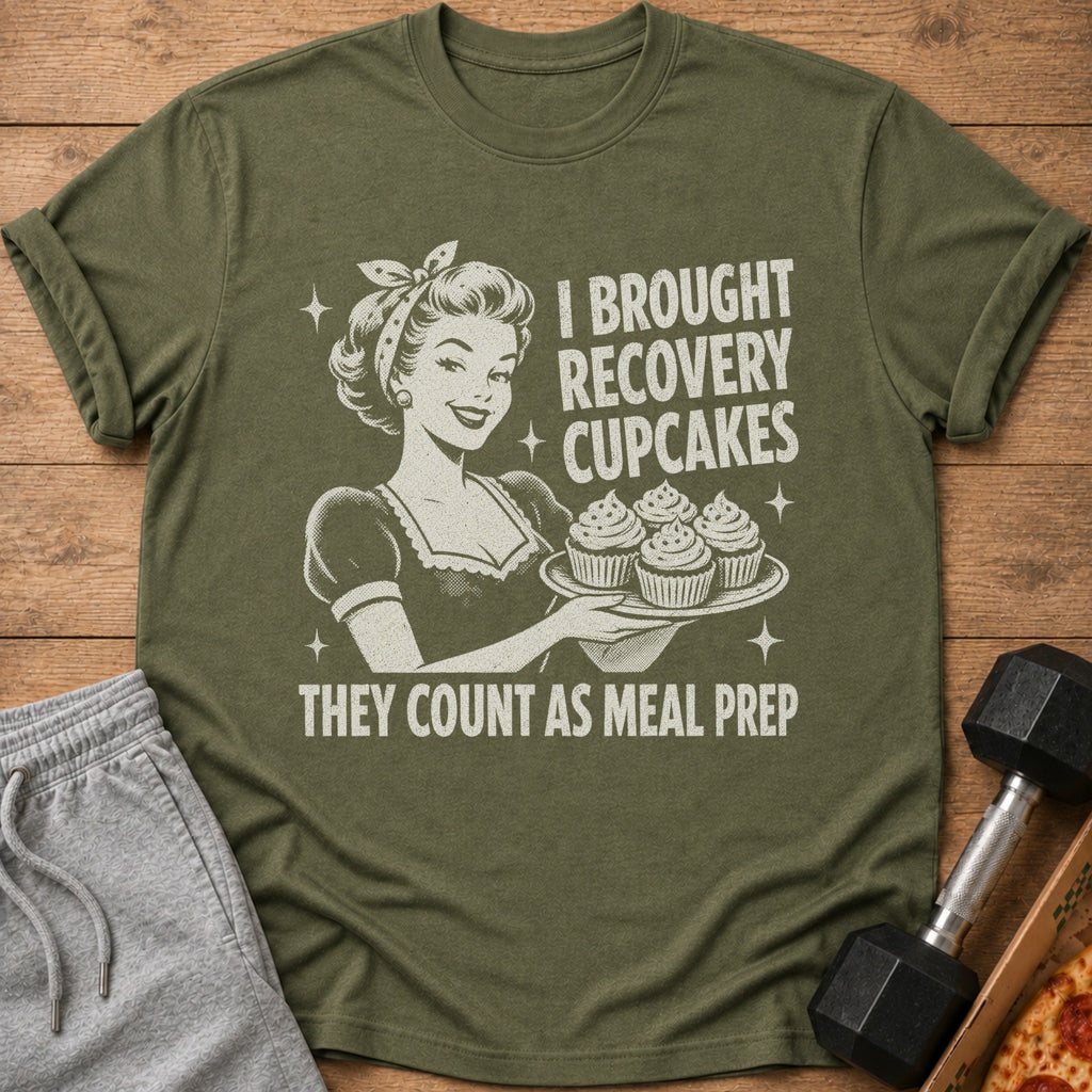 Olive t-shirt with retro illustration and text: "I BROUGHT RECOVERY CUPCAKES THEY COUNT AS MEAL PREP"