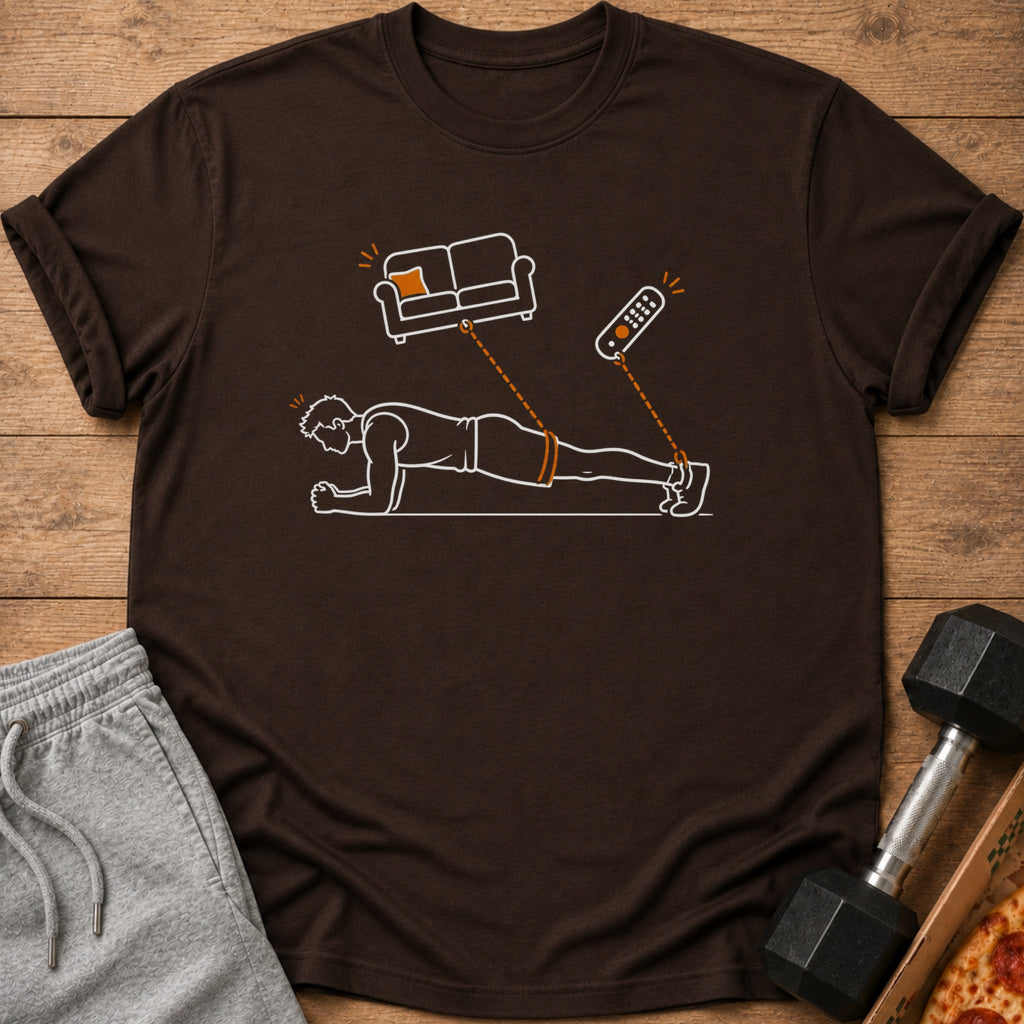 T-shirt graphic of person planking, connected to a couch and remote.