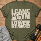 Olive green t-shirt with "I Came To The Gym To Lower My Standards" text.