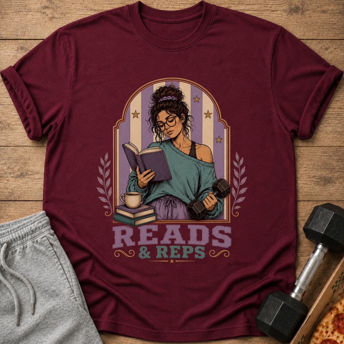 T-shirt with woman reading book and holding dumbbell, text reads Reads & Reps.