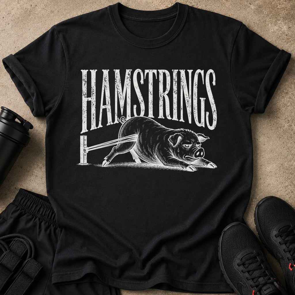 Black t-shirt with "HAMSTRINGS" text above a distressed illustration of a pig exercising