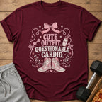 Maroon t-shirt with "CUTE OUTFIT. QUESTIONABLE CARDIO." text and cartoon graphics.