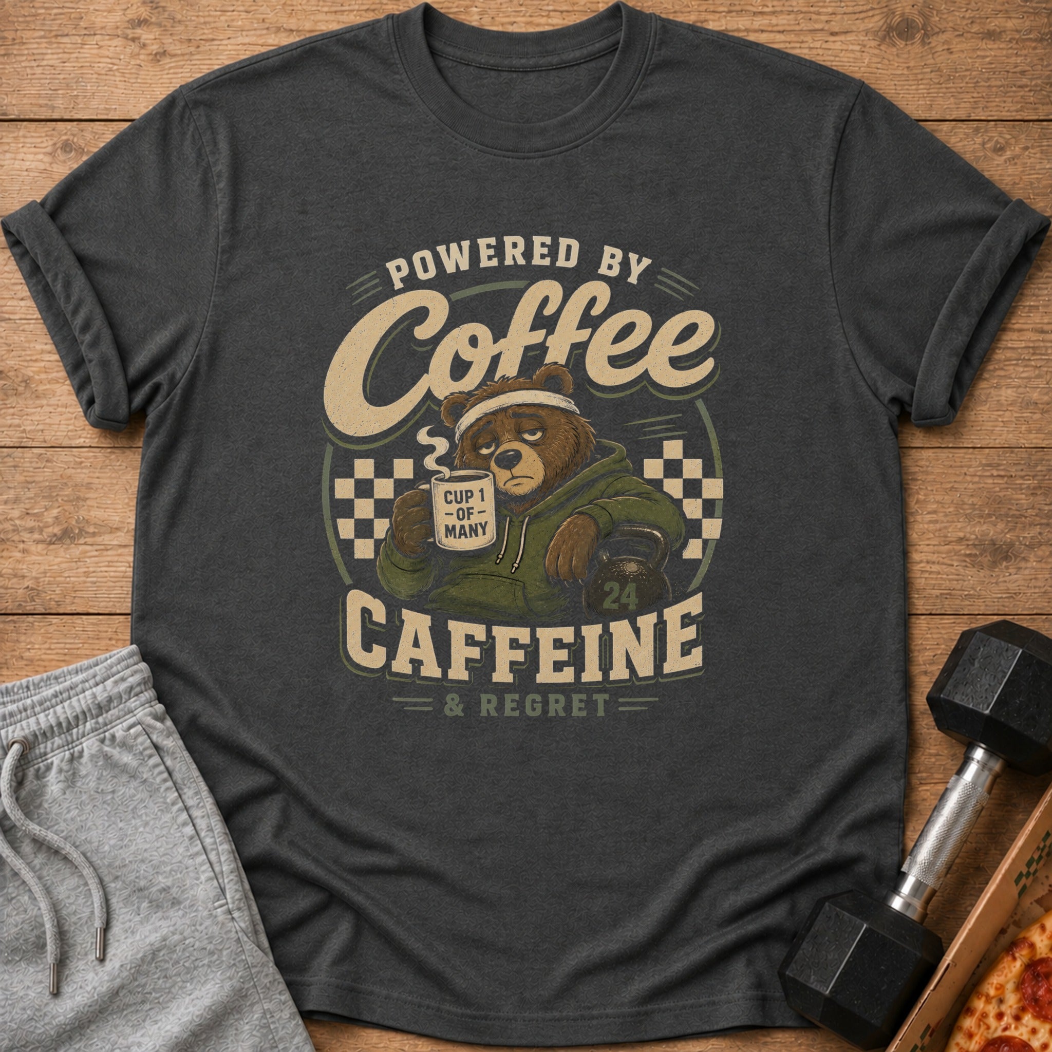 T-shirt graphic of a bear holding coffee, "Powered by Coffee Caffeine & Regret."