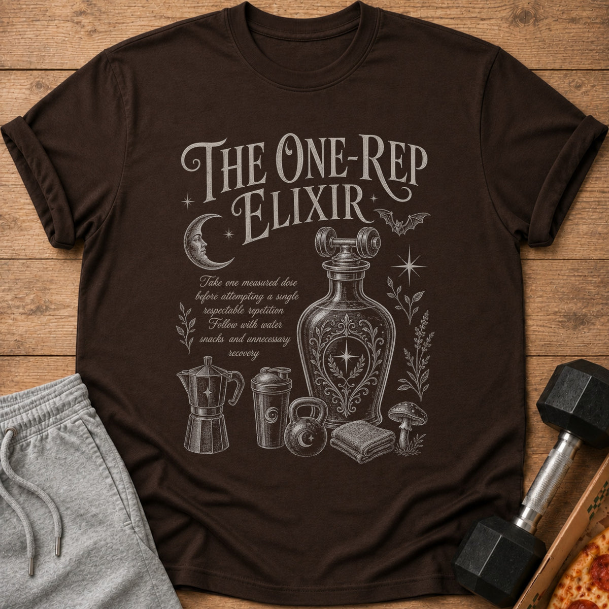 Brown t-shirt with "The One-Rep Elixir" and fitness illustration.