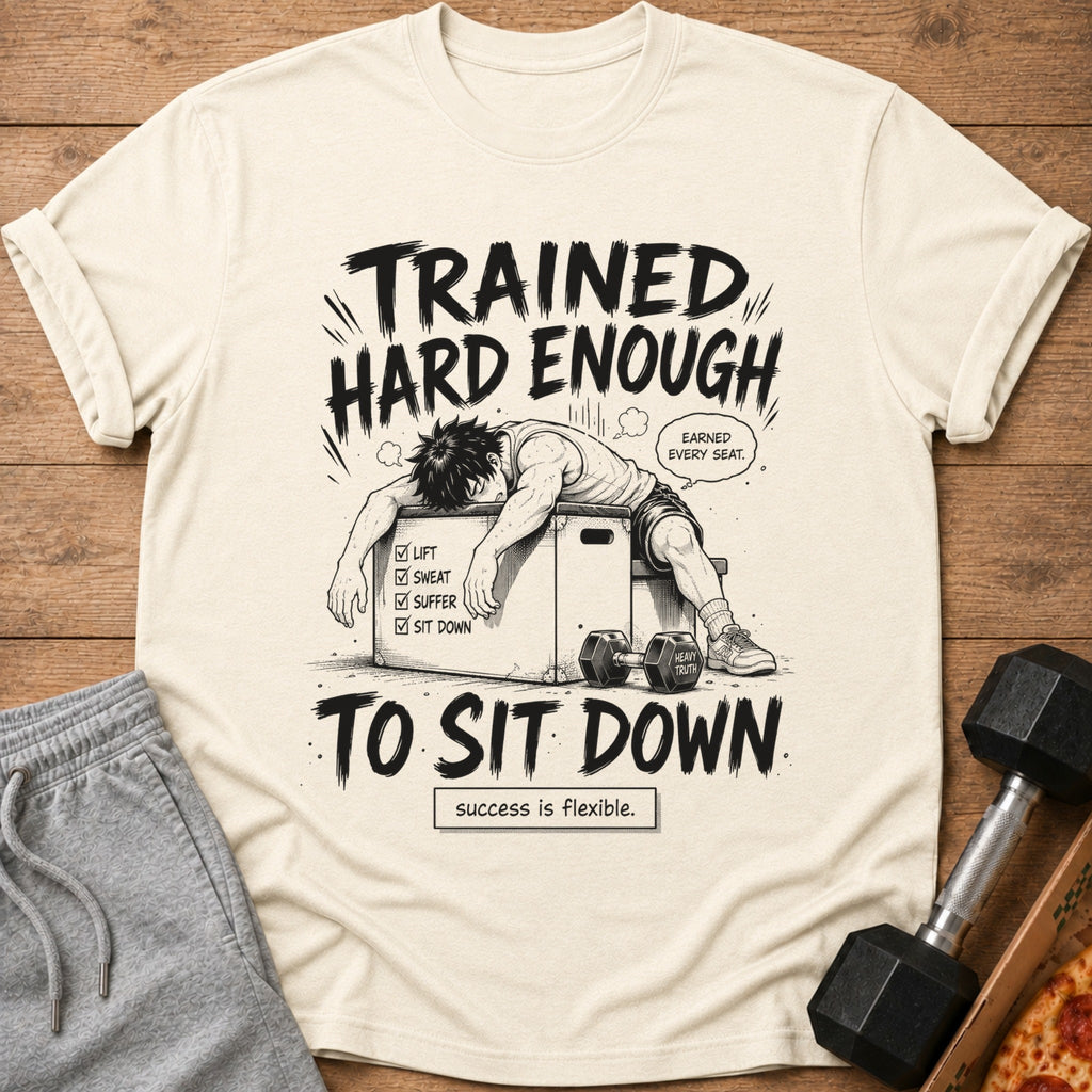 Cream t-shirt with "Trained Hard Enough To Sit Down" graphic.