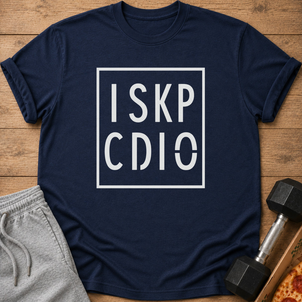 Navy t-shirt with white text "ISKP CDIO" inside a square frame.