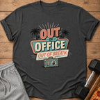 Dark gray t-shirt with "Out of Office Out of Breath" text and a suitcase.