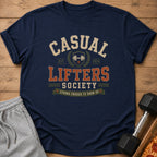 Navy t-shirt with "Casual Lifters Society" text, barbell graphic, and slogan.