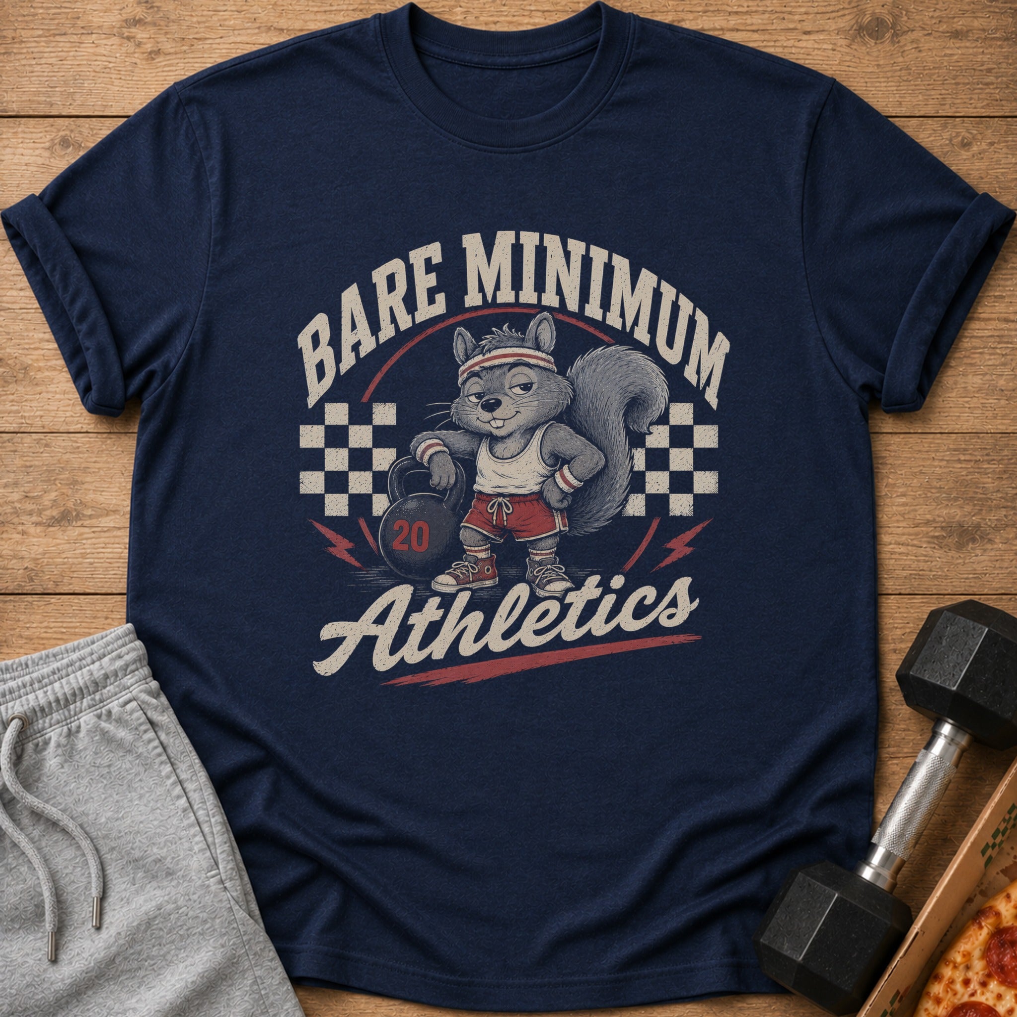 Navy t-shirt with cartoon squirrel lifting 20lb dumbbell, text "BARE MINIMUM Athletics".