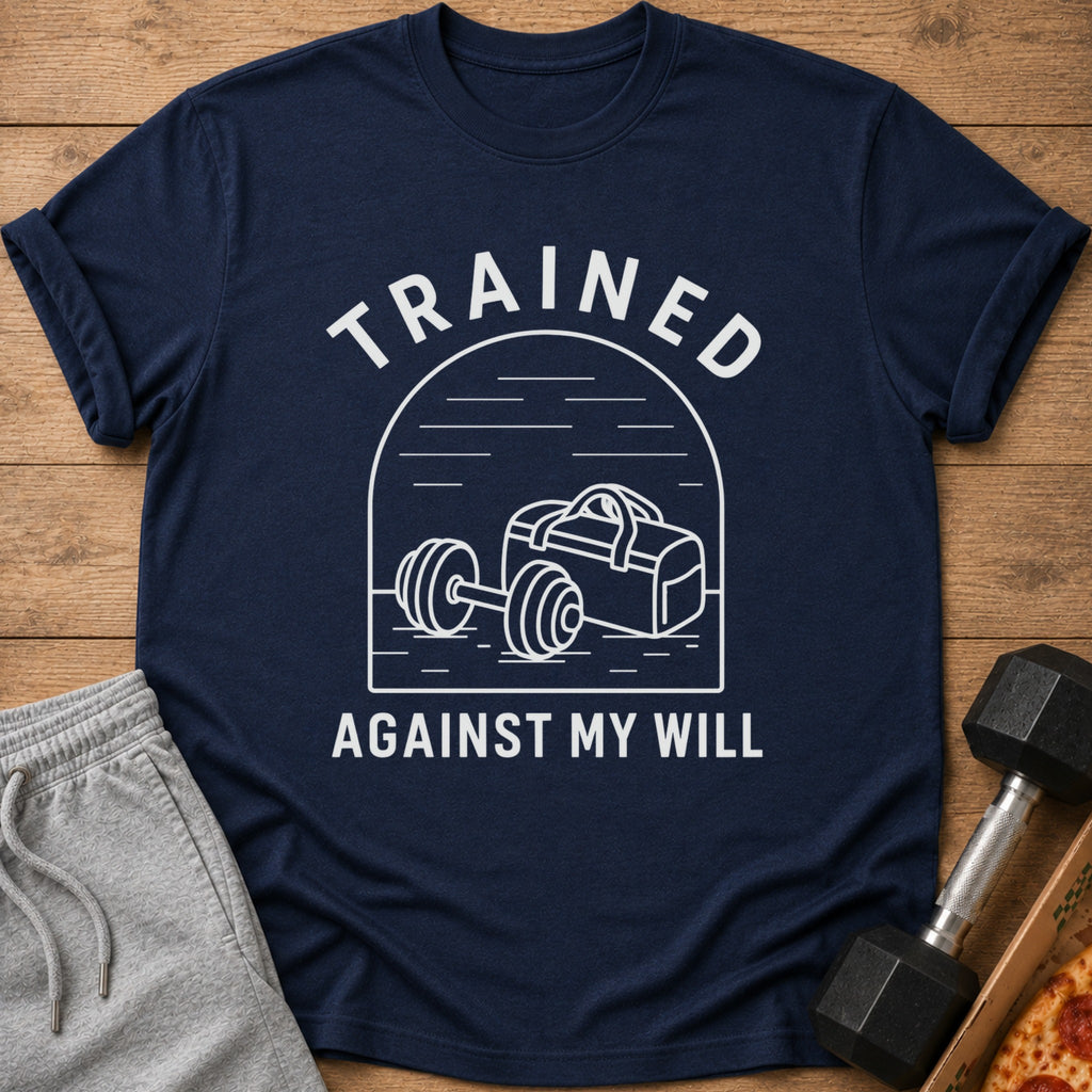 Navy t-shirt with white text "TRAINED AGAINST MY WILL" and gym bag with barbell illustration.