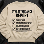 Tan sweatshirt with "Gym Attendance Report" checklist: Showed Up, Touched Equipment, Enjoyed Cardio, Left With Dignity.