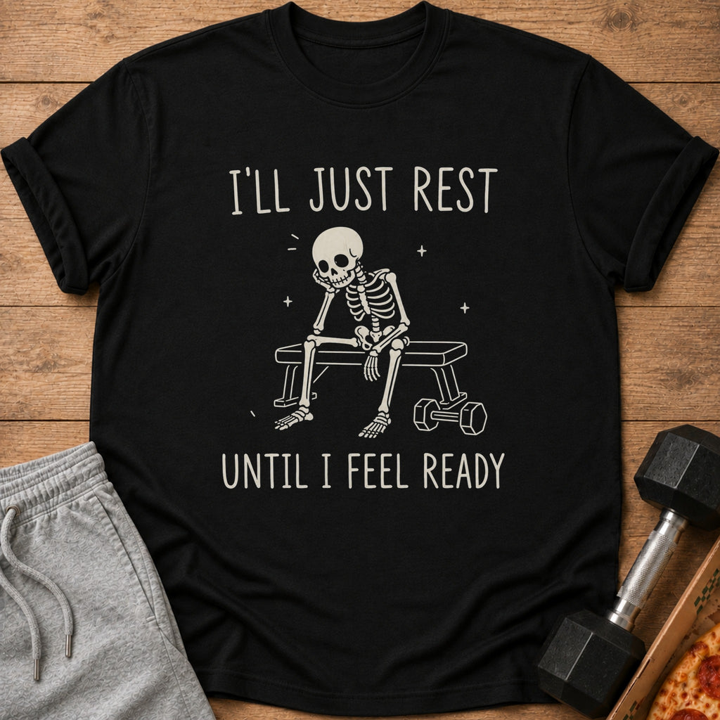 Black t-shirt with skeleton resting on bench, text "I'LL JUST REST UNTIL I FEEL READY".