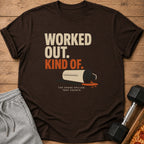 Brown t-shirt with "WORKED OUT. KIND OF. THE SHAKE SPILLED. THAT COUNTS." text and spilled shaker.