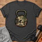 T-shirt with graphic of a silhouette inside a kettlebell at a gym.