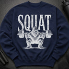 Navy sweatshirt with distressed text "SQUAT" and Bigfoot lifting weights.