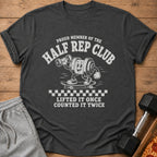 Dark grey t-shirt with "Proud Member of the Half Rep Club" and barbell graphic.