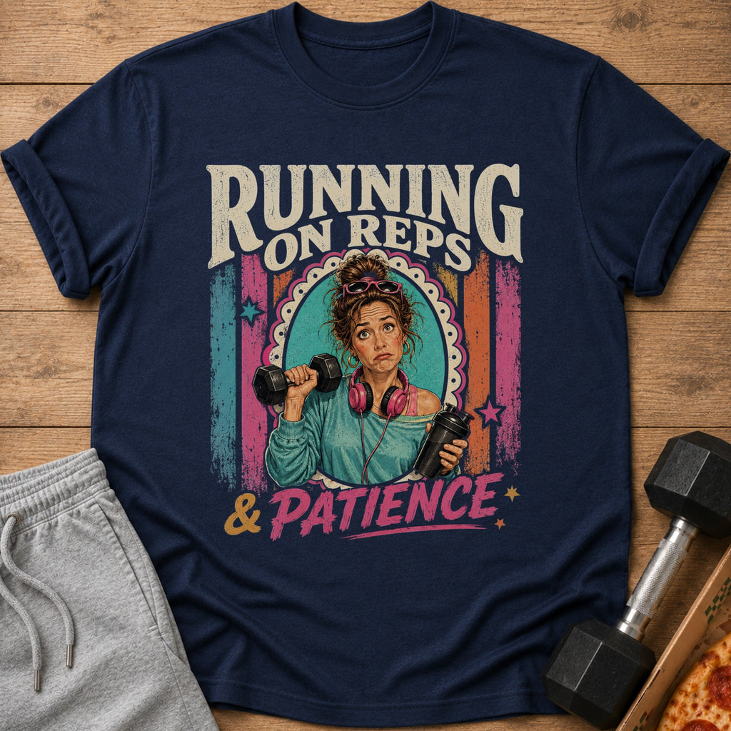 Navy t-shirt with graphic "Running on Reps & Patience" and a woman holding a dumbbell.