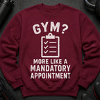 Maroon sweatshirt with white text "GYM? MORE LIKE A MANDATORY APPOINTMENT".
