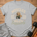 Gray t-shirt with a cartoon capybara lifting weights and the text "Muscles Sold Separately".