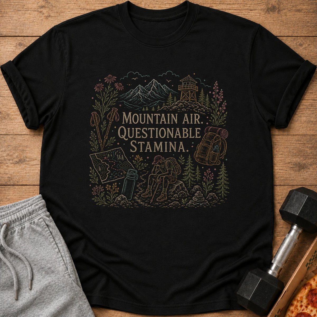 Black t-shirt with "Mountain Air. Questionable Stamina." text and hiking graphic.