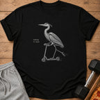 Black t-shirt with heron riding a scooter and text "taking it easy".