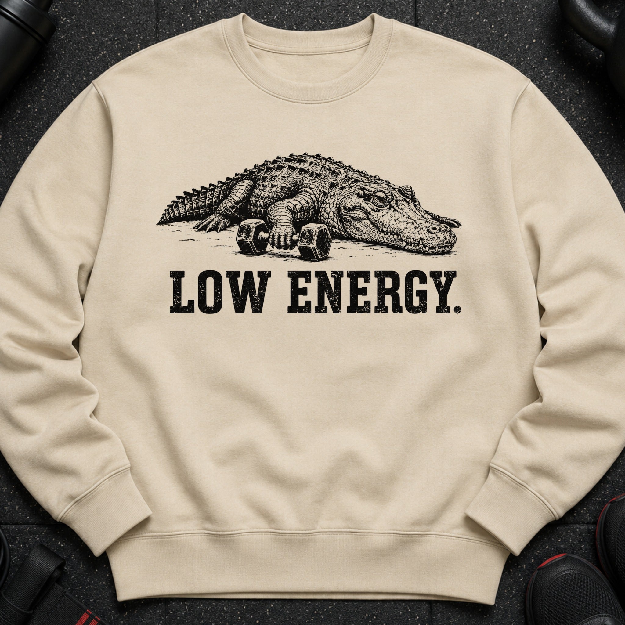 Crewneck sweatshirt with alligator and "LOW ENERGY" text graphic.