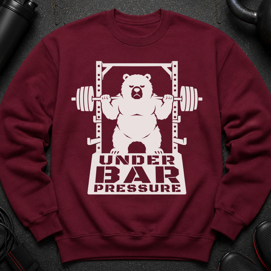 Maroon sweatshirt with white graphic of a bear lifting a barbell. Text reads "UNDER BAR PRESSURE".