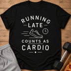 Black t-shirt with white text: "Running late counts as cardio" and shoe graphic.
