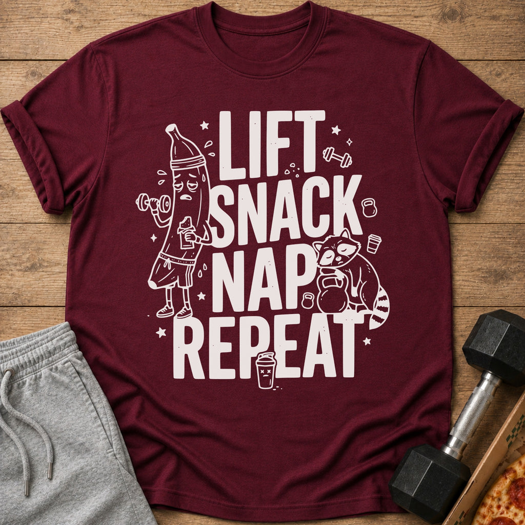 Maroon t-shirt with white text "LIFT SNACK NAP REPEAT" and cartoon illustrations.