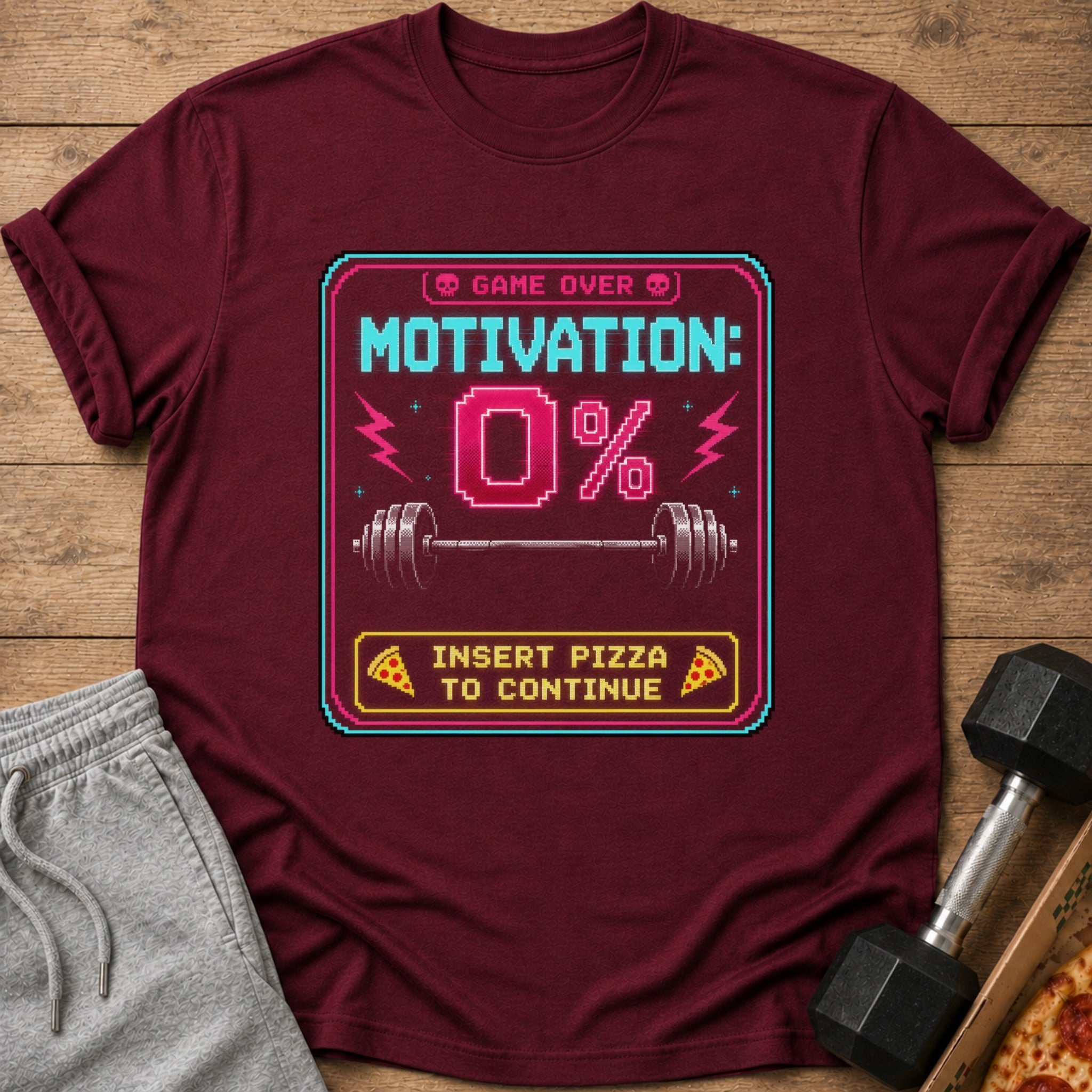 Maroon t-shirt with "Game Over Motivation 0% Insert Pizza to Continue" graphic.