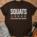 Brown t-shirt with "SQUATS" and one star, "WALKED DOWN STAIRS SIDEWAYS."