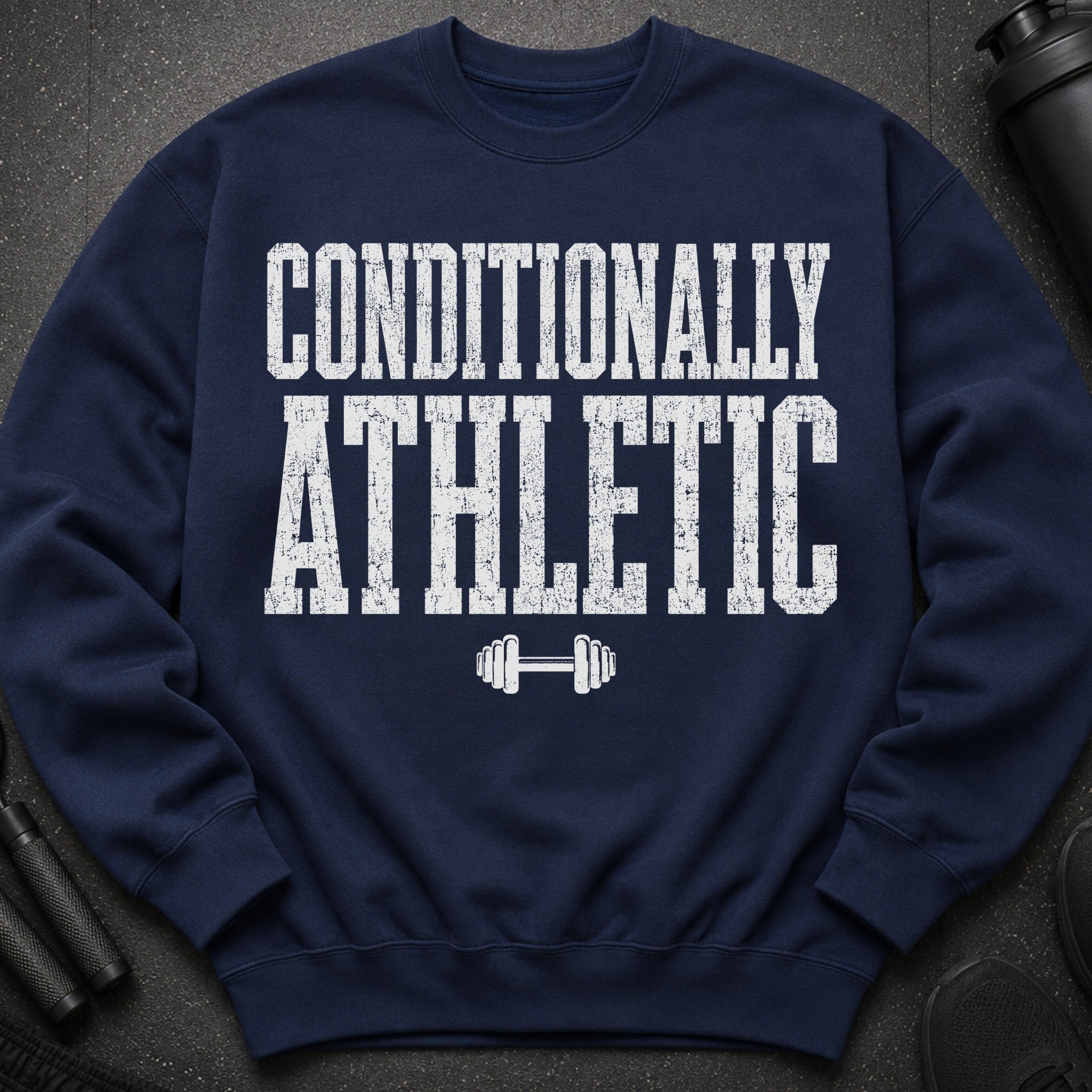 Navy sweatshirt with distressed white text "CONDITIONALLY ATHLETIC" and dumbbell graphic.