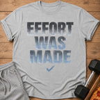 Grey t-shirt with the text "EFFORT WAS MADE" and a blue checkmark.