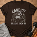 Brown t-shirt with distressed print of a panda on a weight bench holding a dumbbell.
