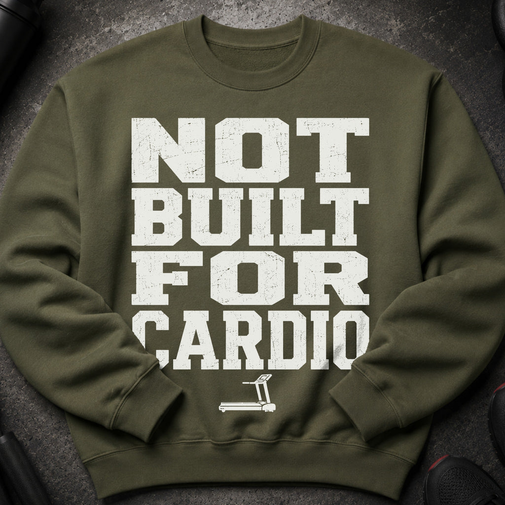 Olive green sweatshirt with white distressed text "NOT BUILT FOR CARDIO" and treadmill graphic.