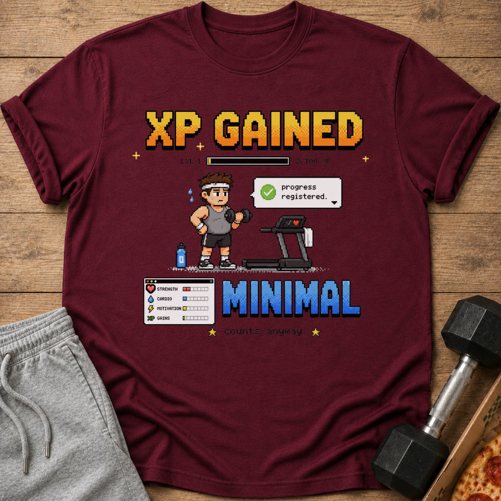 Maroon t-shirt with pixel art of gamer working out, "XP GAINED" and "MINIMAL counts anyway."